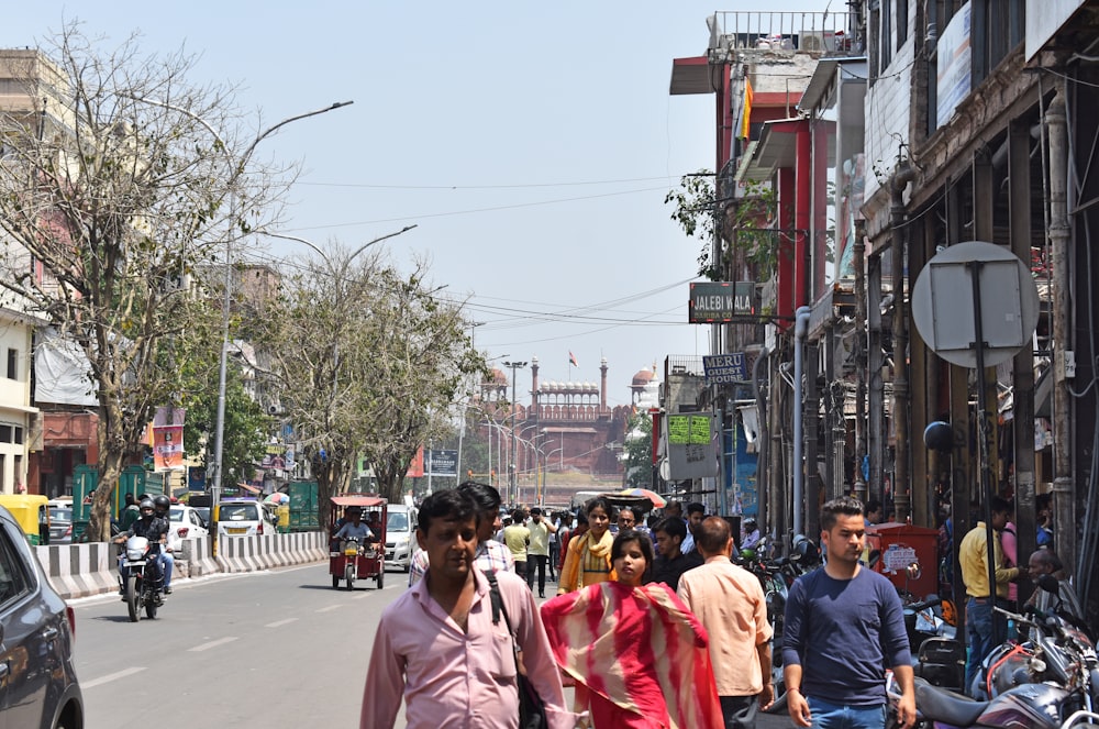 a busy street with people and vehicles