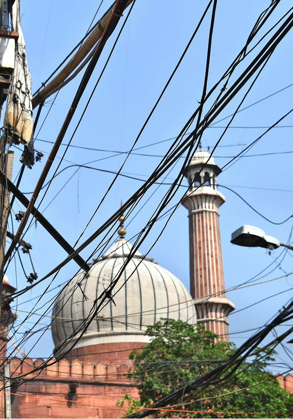 a domed building with wires