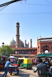 a large crowd of people walking on a street