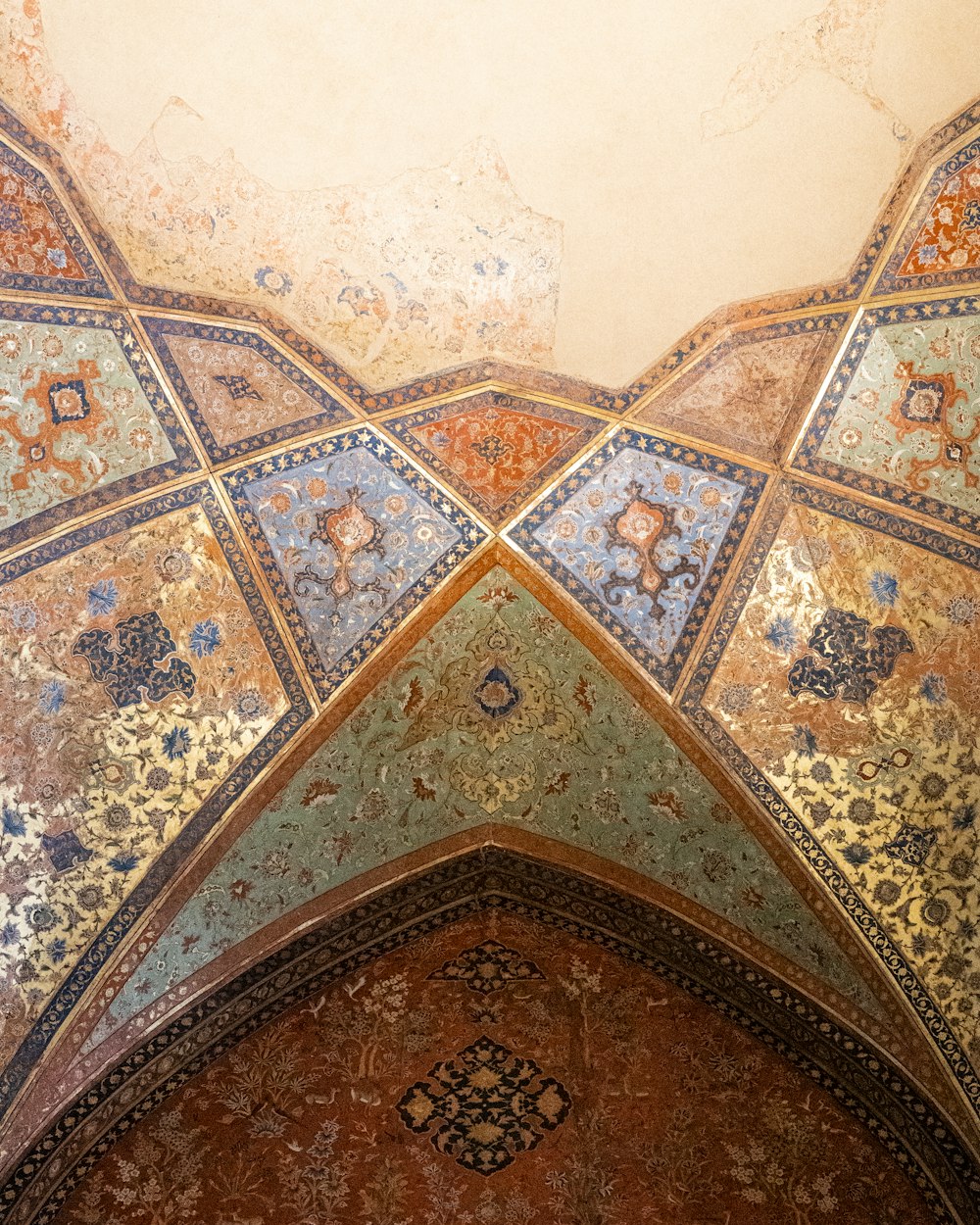 a domed ceiling with a design