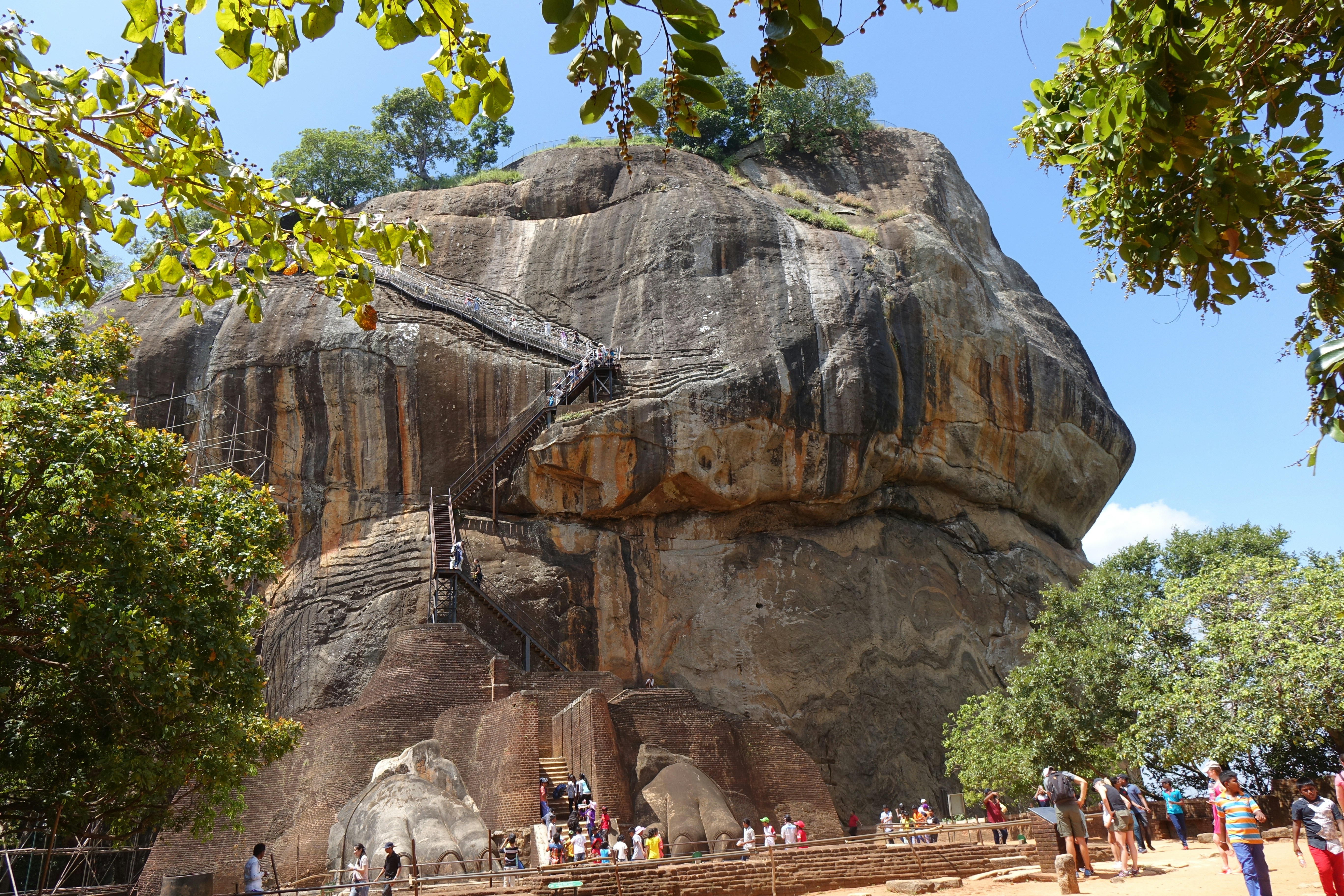 A large rock formation with people around it photo – Free Sri lanka ...