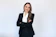 a woman in a black suit