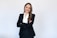 a woman in a black suit