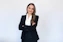 a woman in a black suit