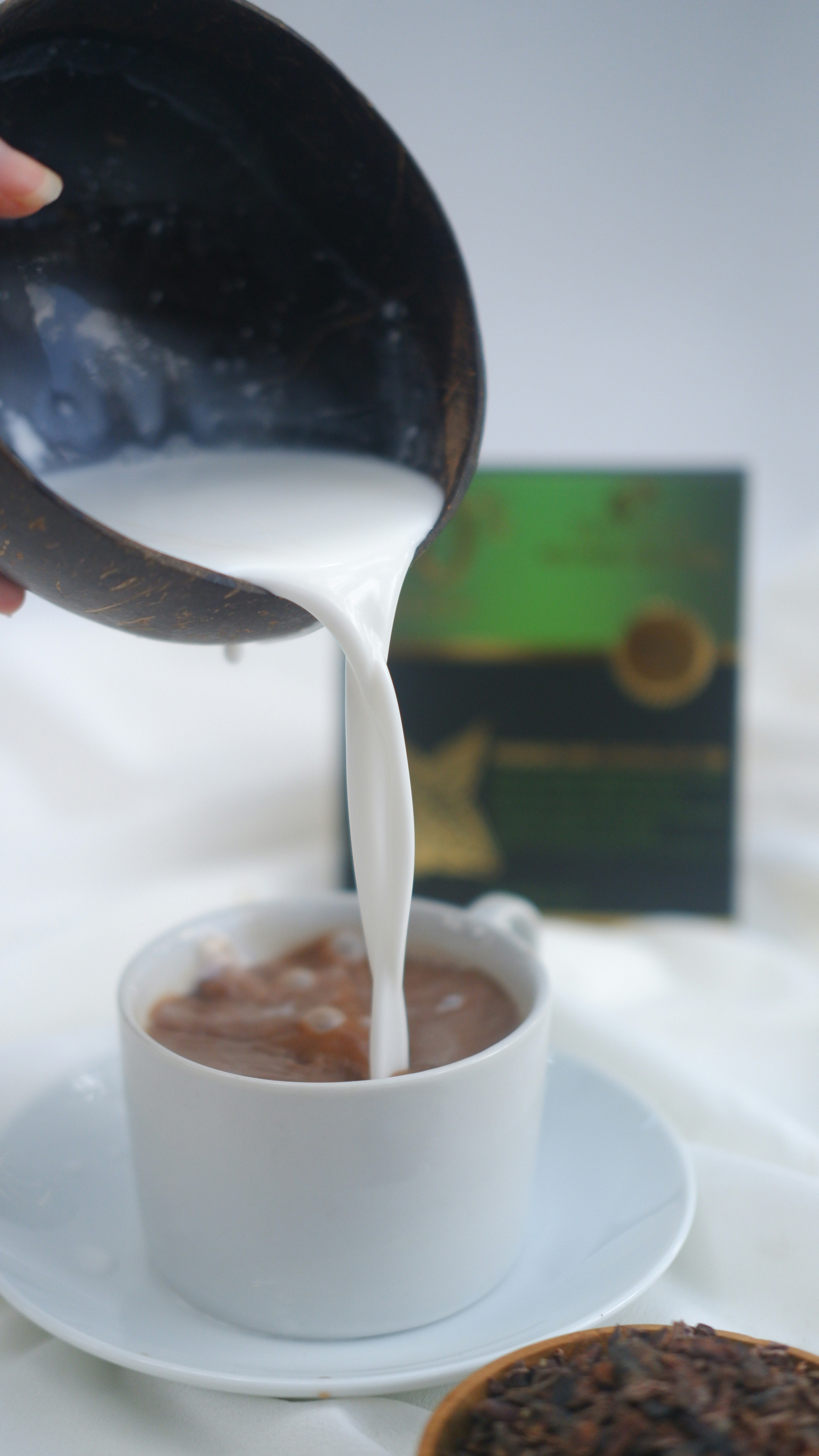 a cup of coffee with a spoon