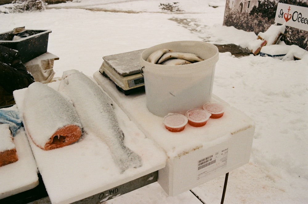 a group of boxes with food in them in the snow