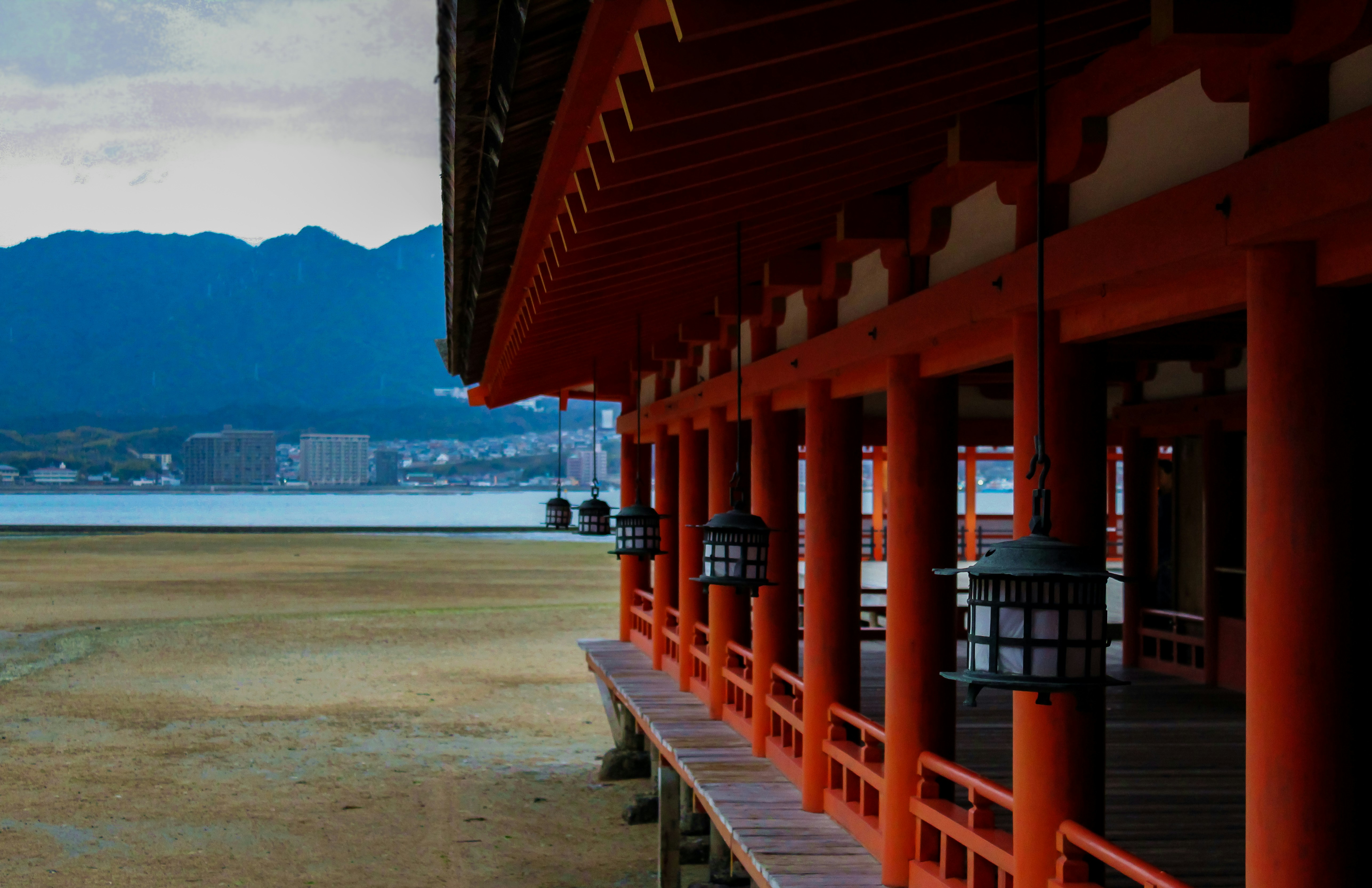 a red bridge over water