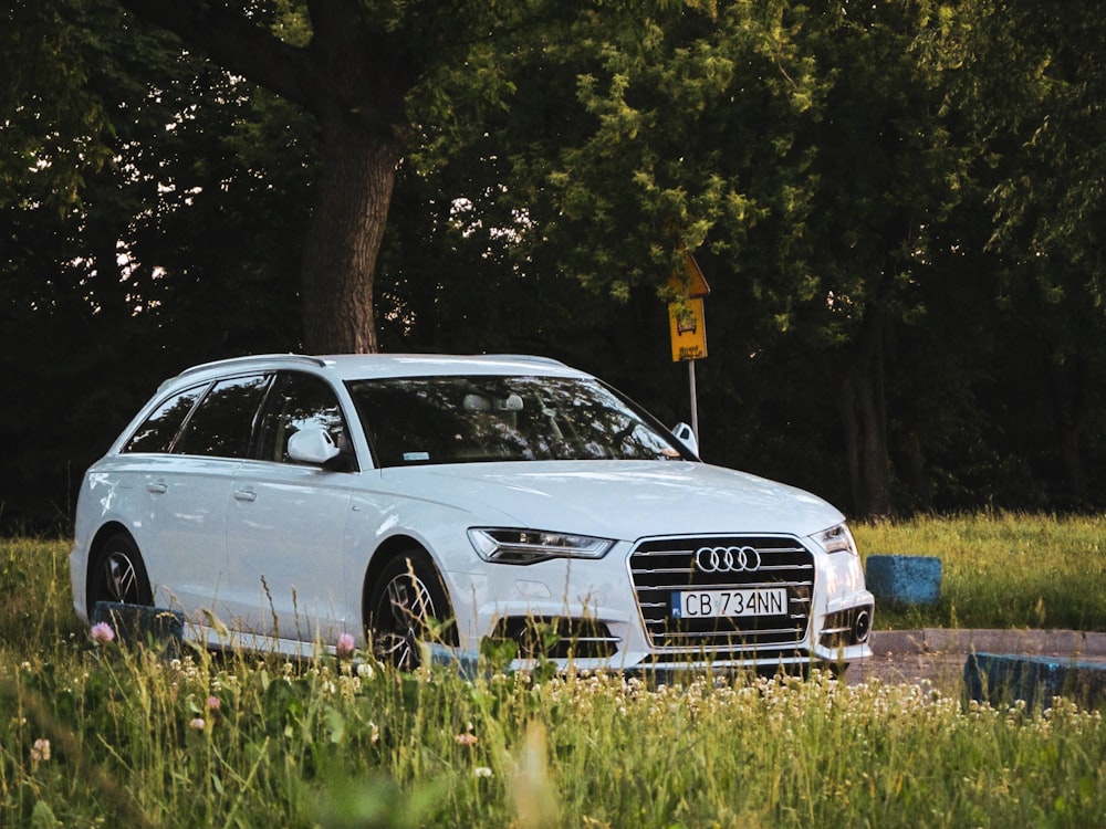 a white car parked on a road