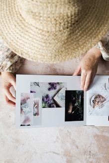 a person holding a photo book