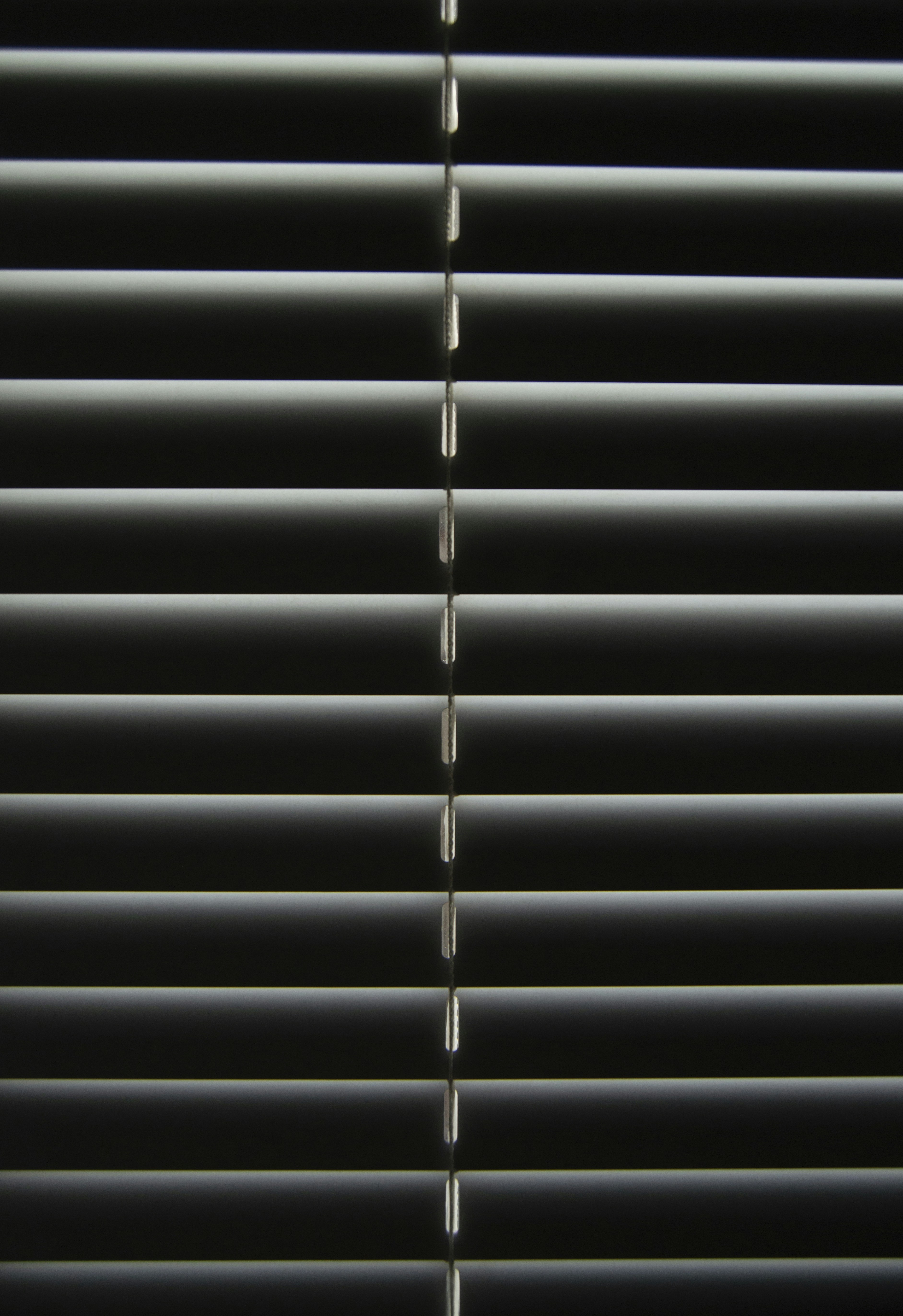 a chain on a metal bar