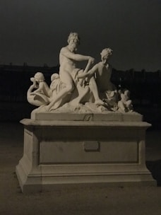 Finished sculpture displayed elegantly with soft gallery lighting.