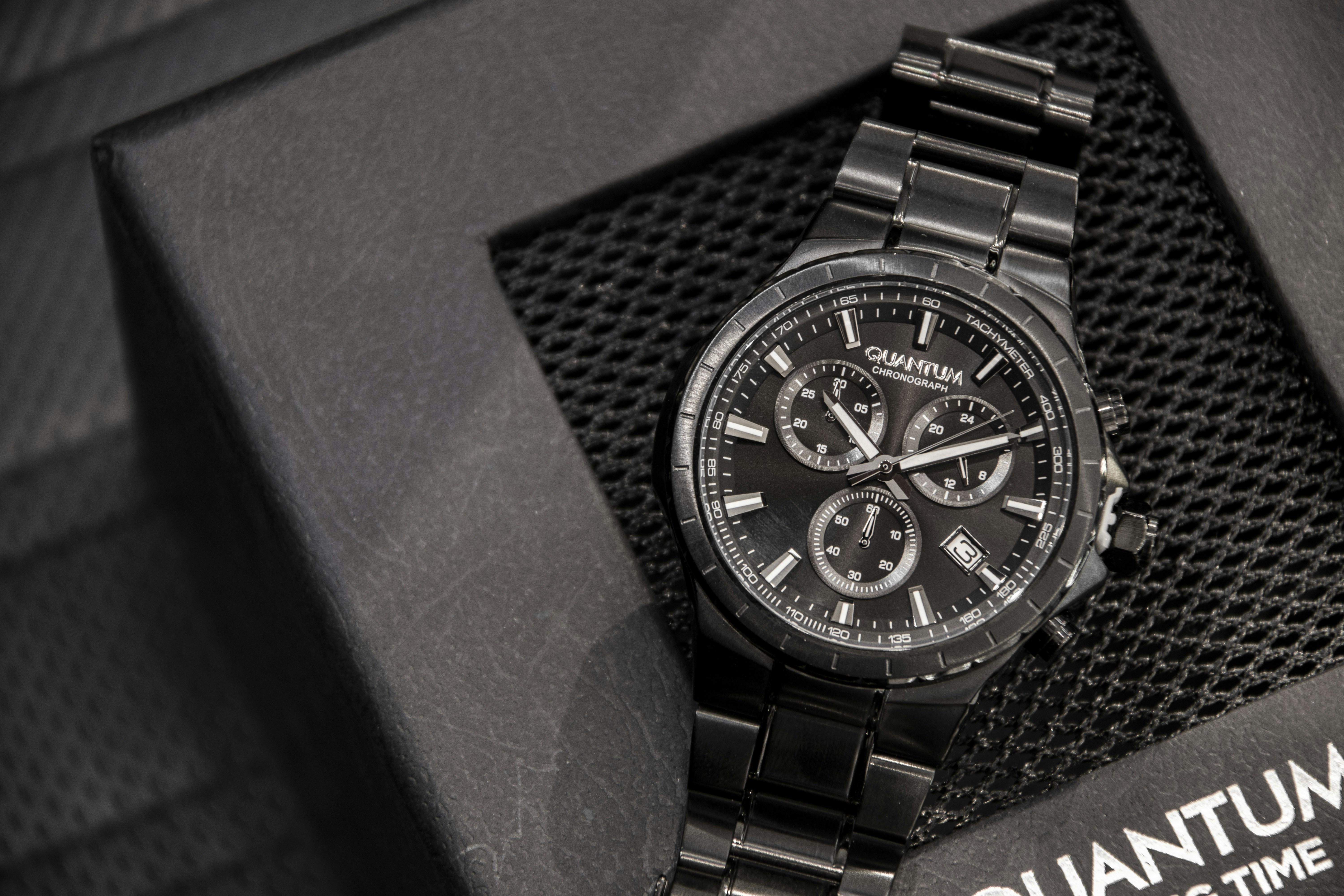 a black watch on a person