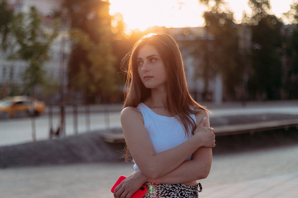 a woman with her arms crossed