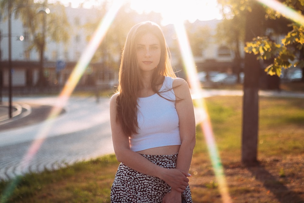 a woman standing in a park