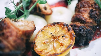 A close-up of a grilled meat platter from Lyandro Nunes.