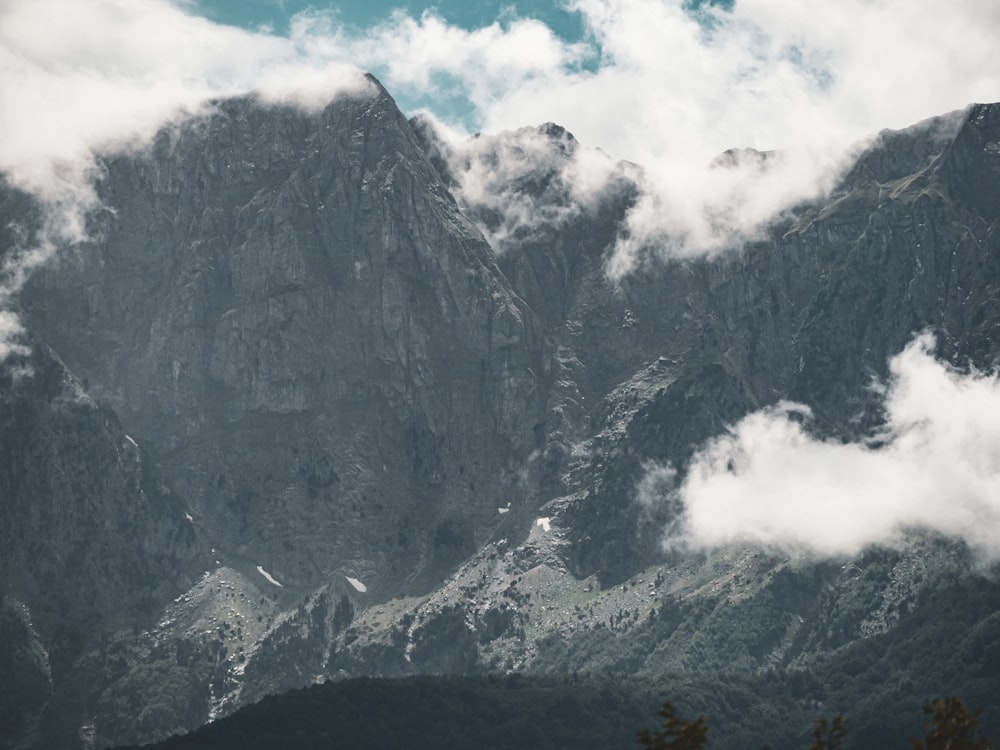 a mountain with clouds