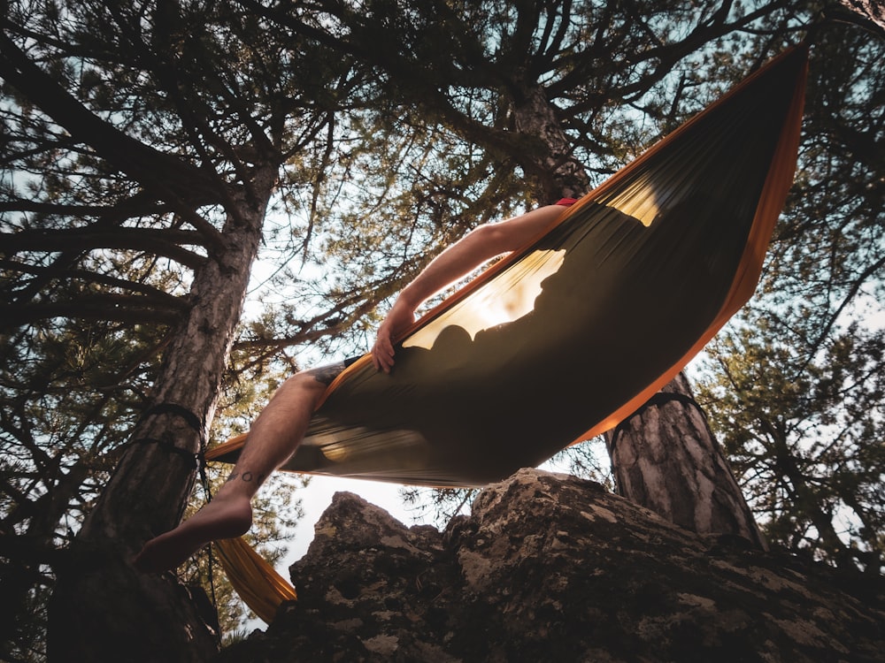 a person is holding a surfboard