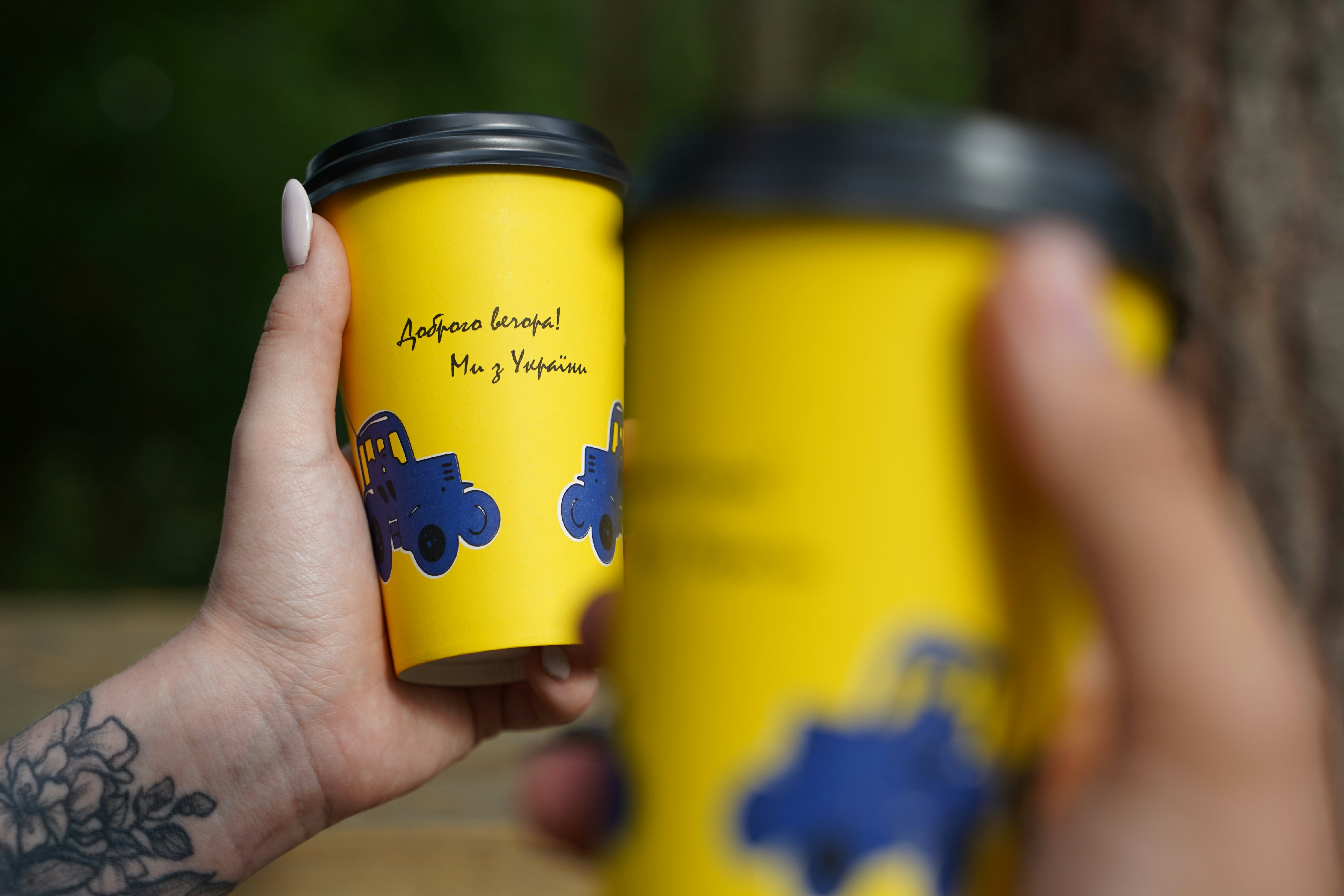 a person holding a can