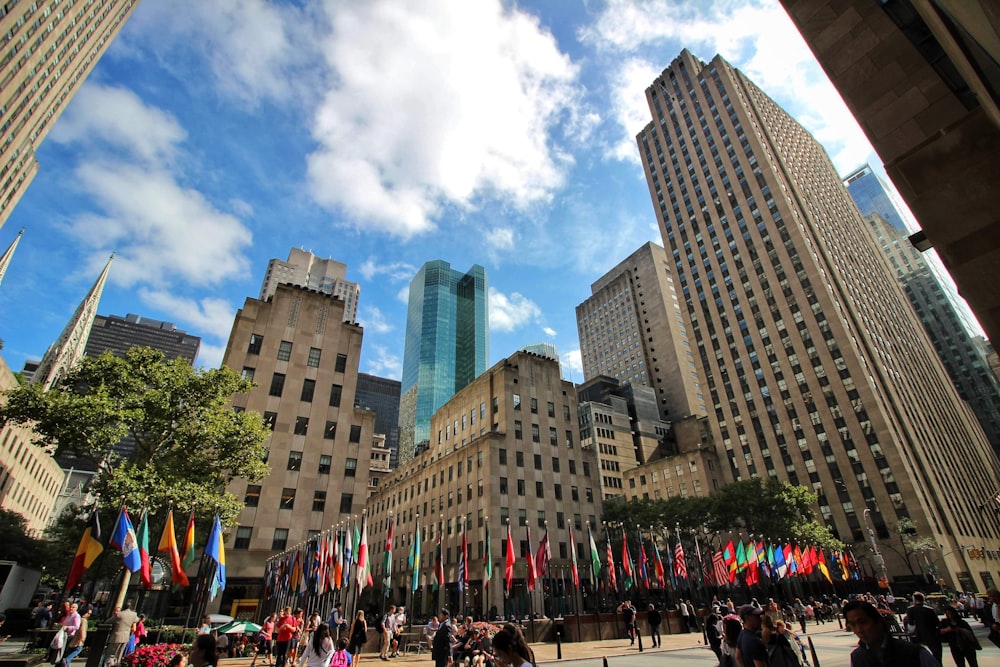 a group of people walking in a city