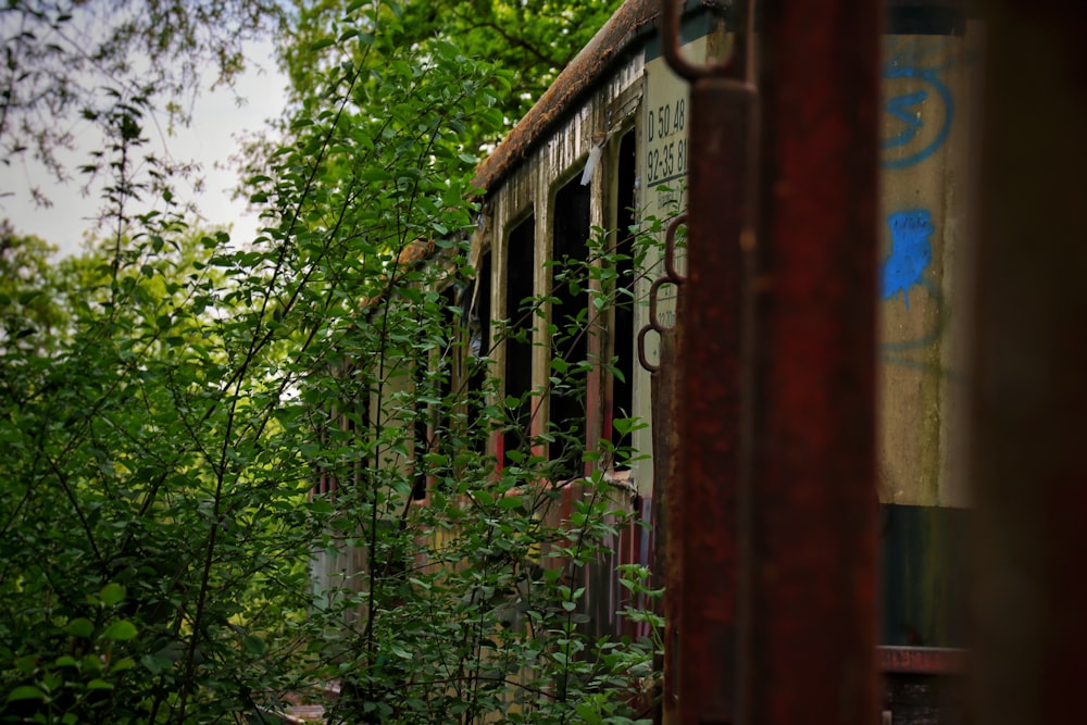 a red building with trees in the background