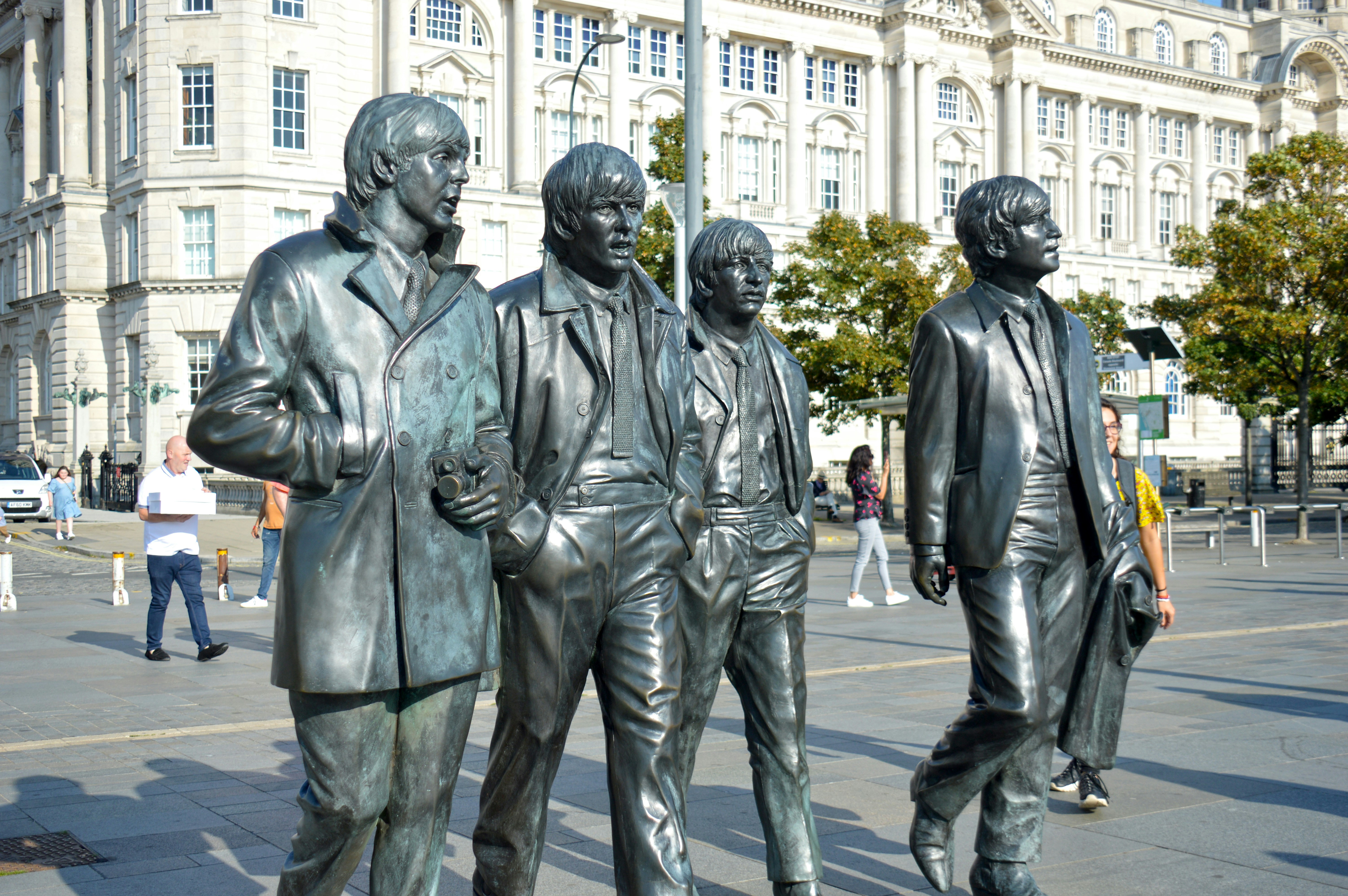 The beetles statue facing the Liverpool water front