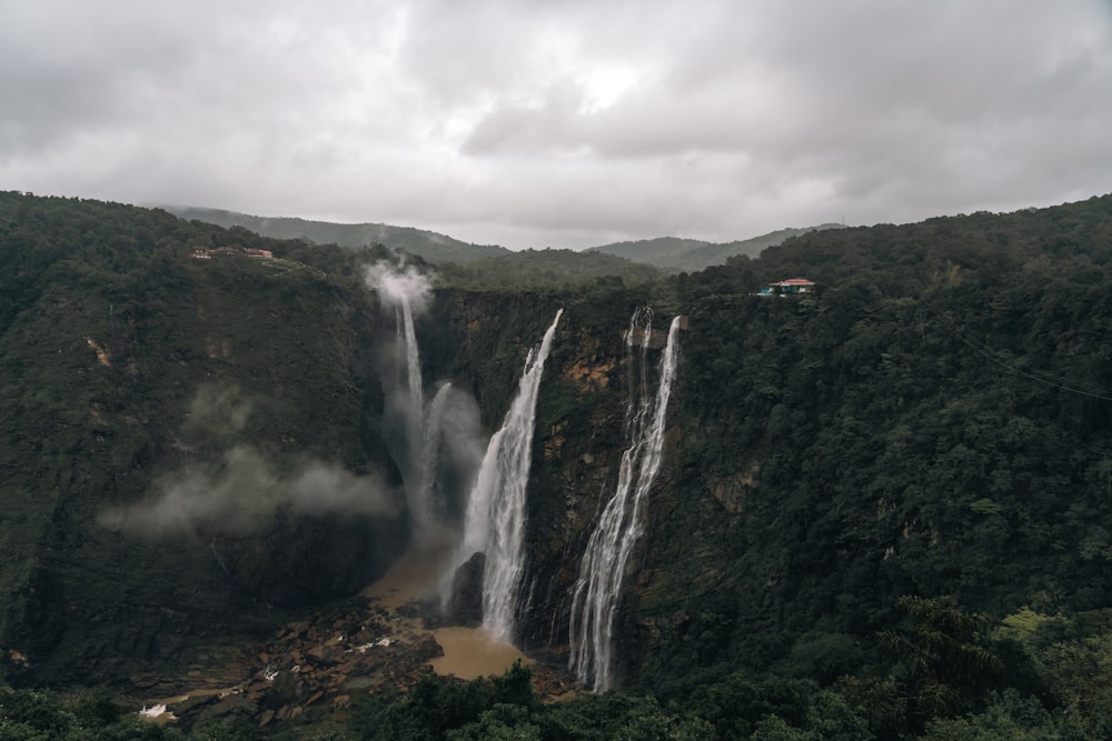 a waterfall in a forest