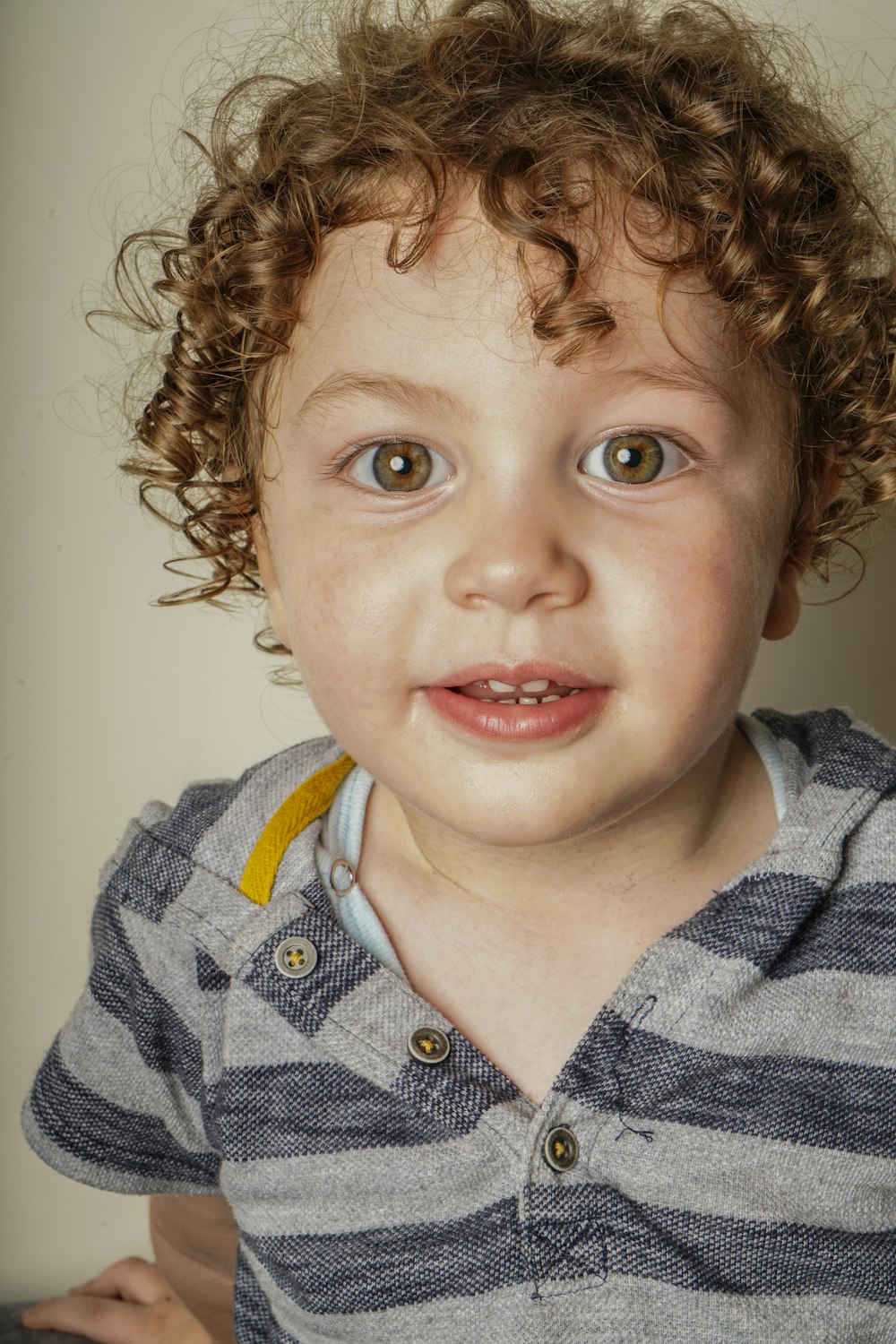 a child with curly hair