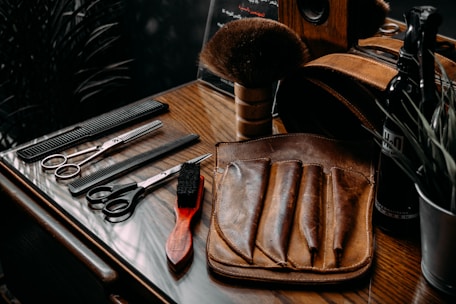 a purse and knife on a table