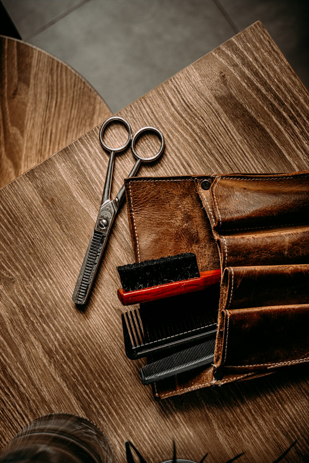 a pair of scissors and a wallet