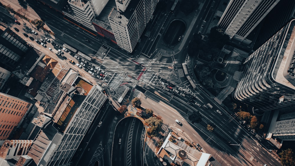 a city street with cars and buildings