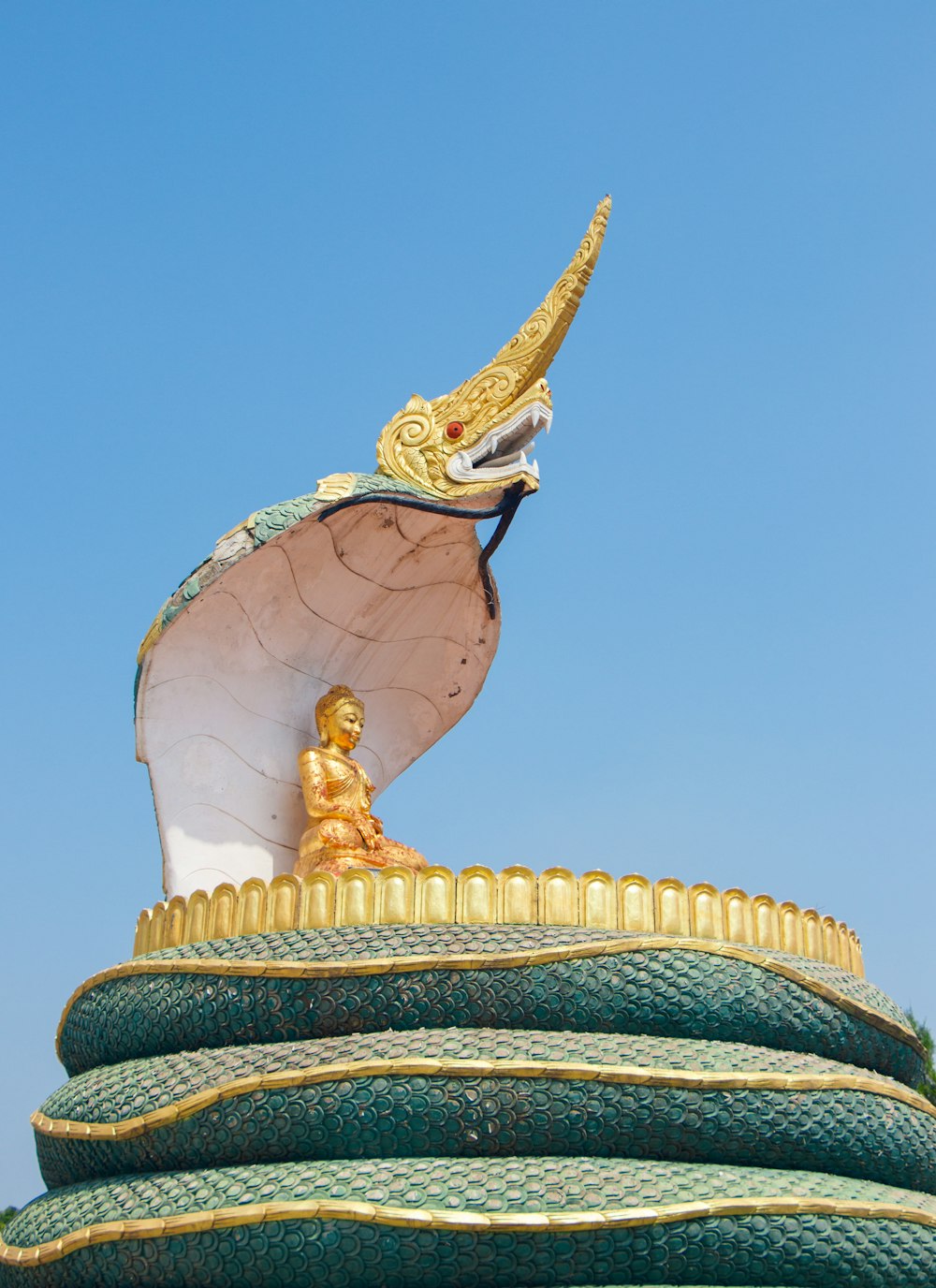 a statue on top of a building