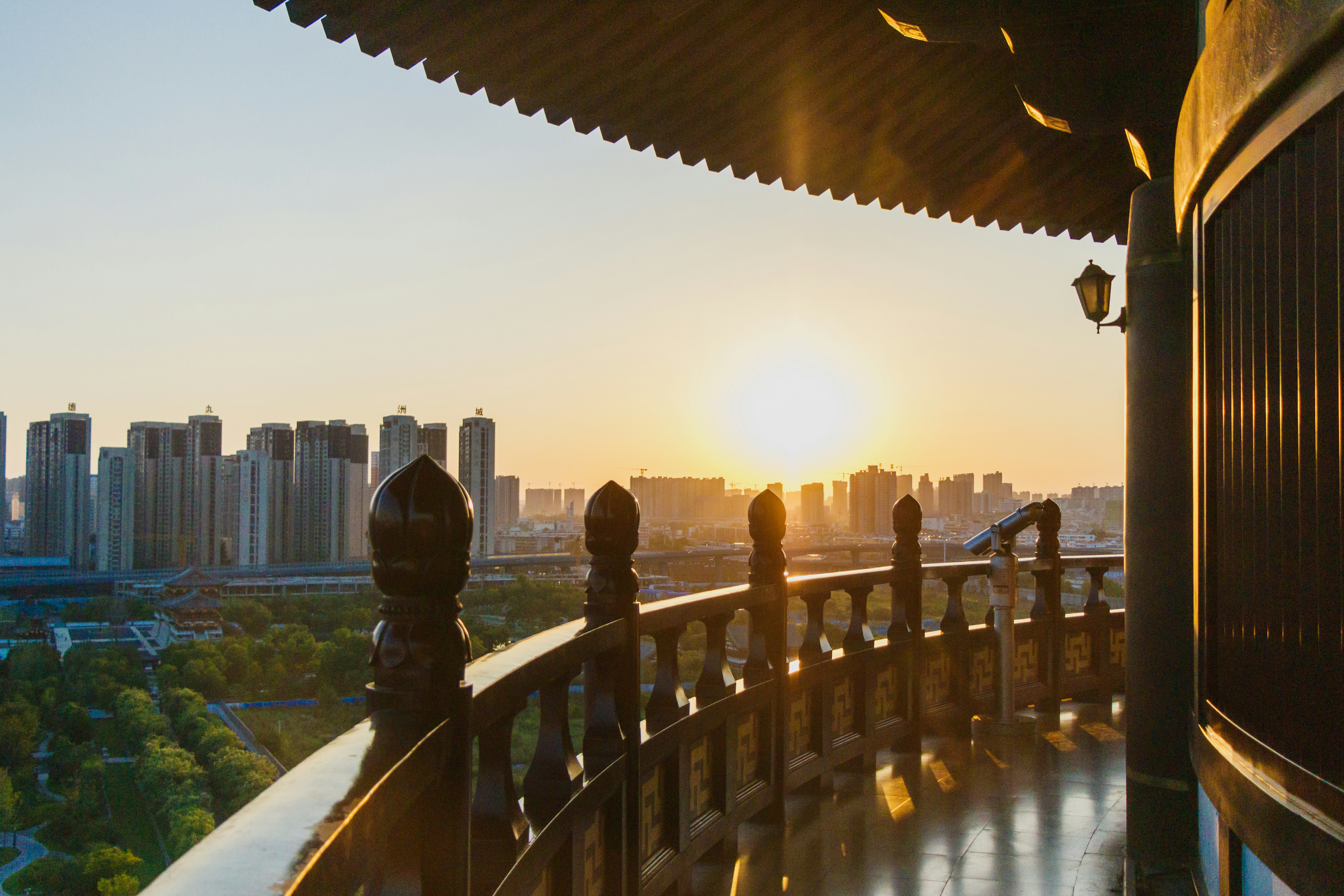 a view of a city from a balcony