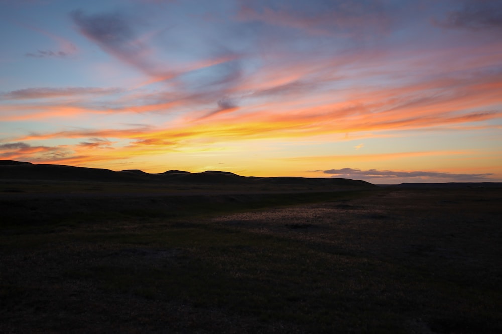 a landscape with a sunset