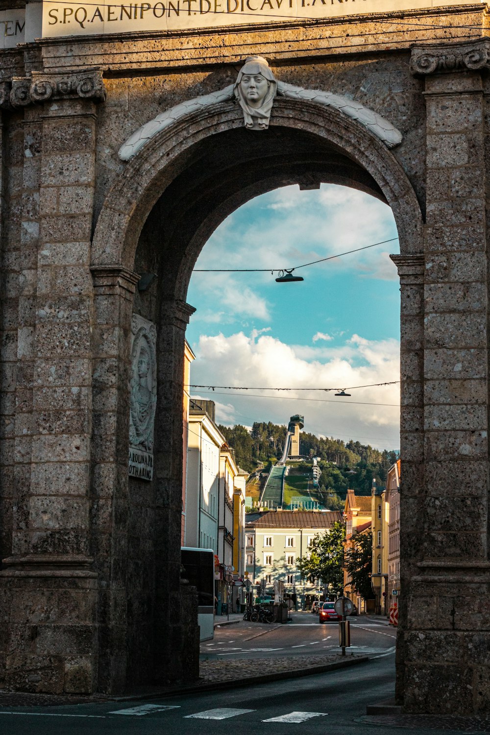 a stone archway over a street
