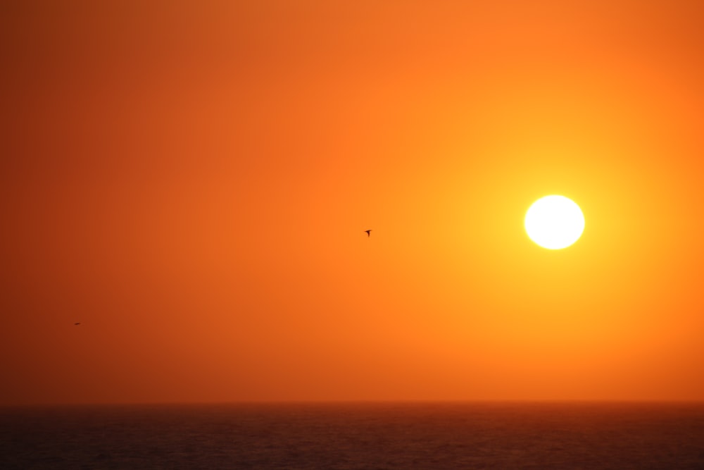 a sunset over the ocean