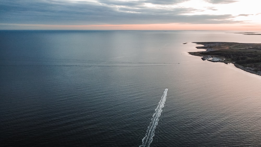 a body of water with land in the distance