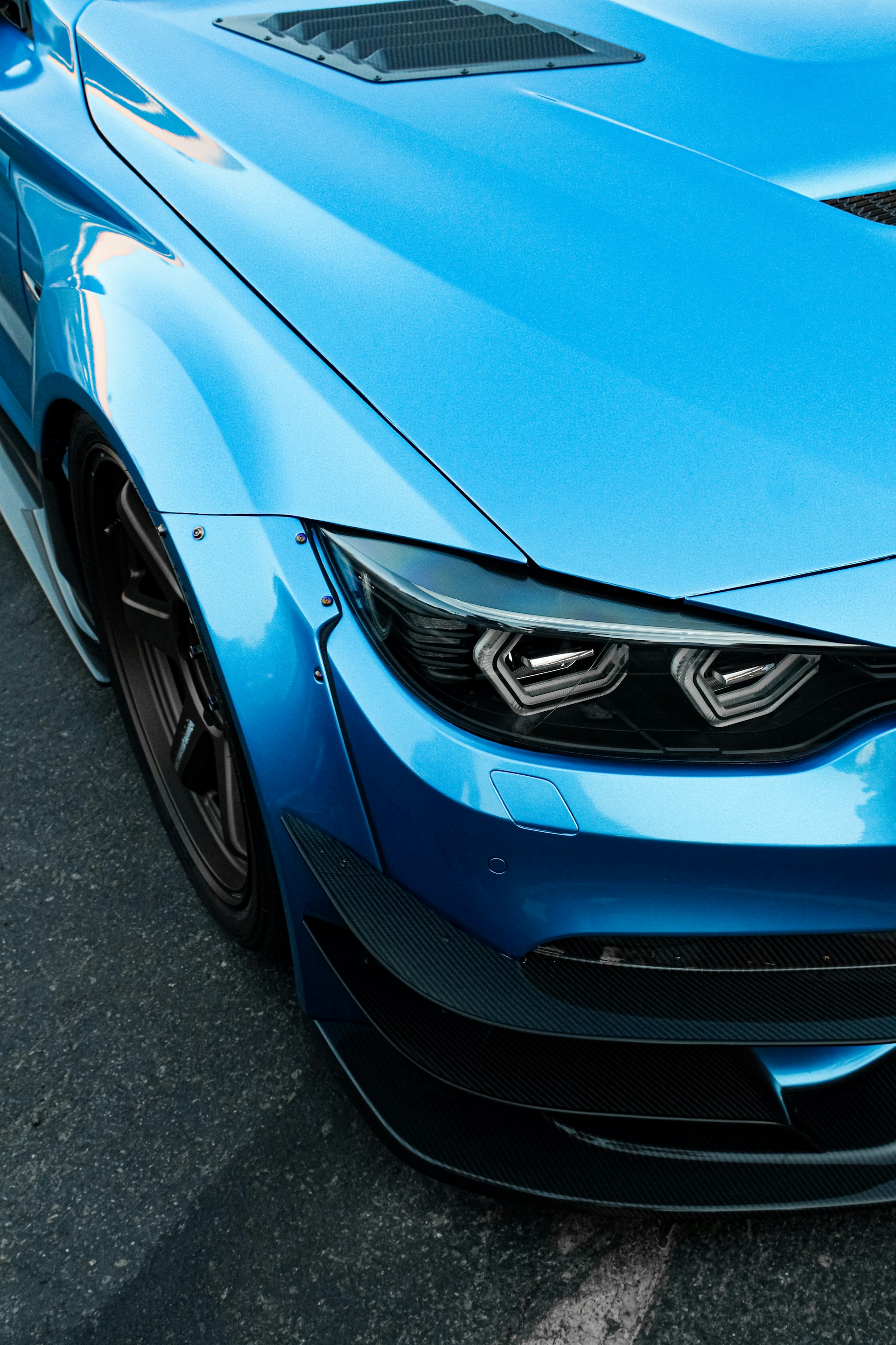 the front of a blue car