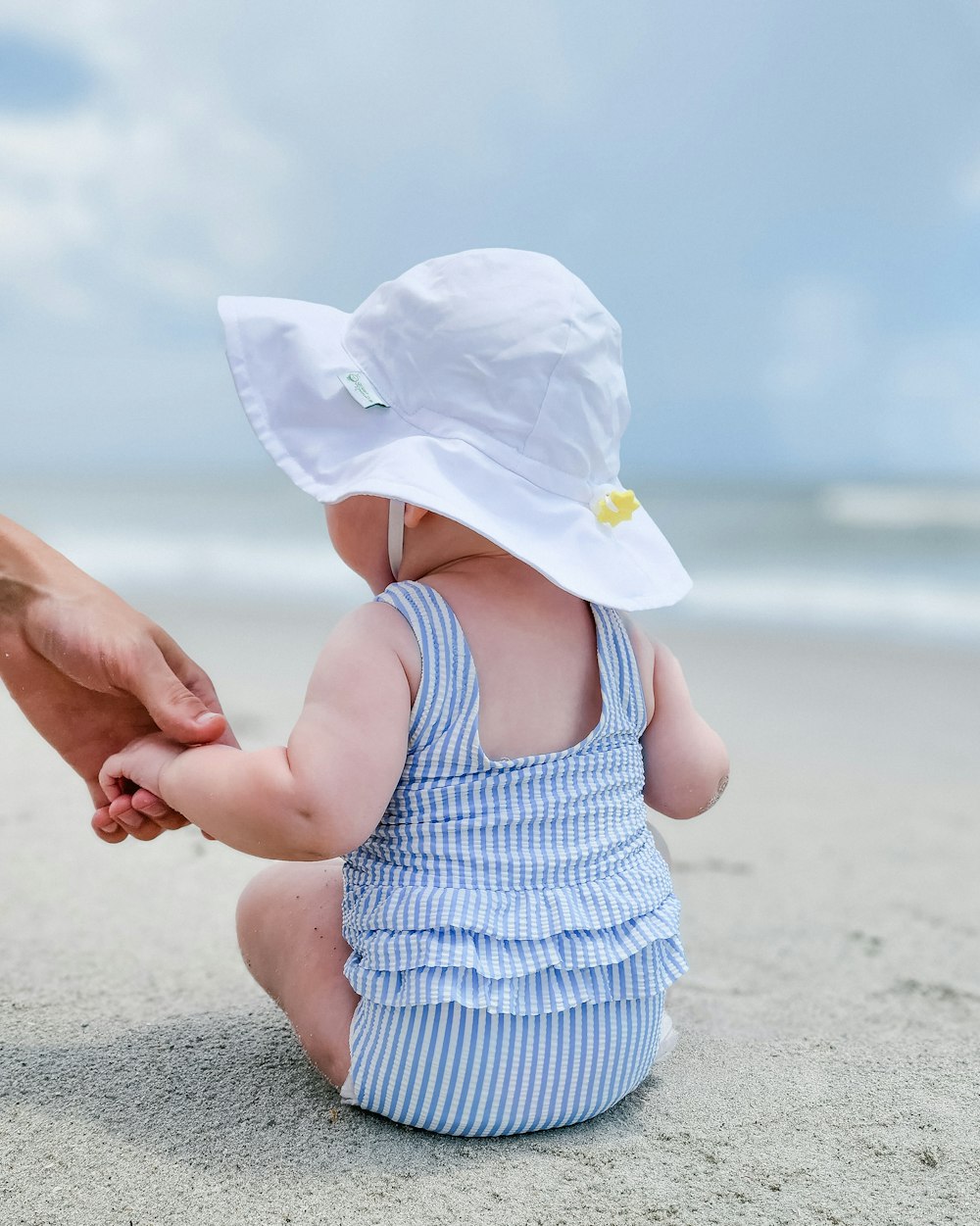 a baby wearing a hat