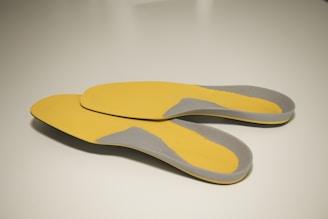 a yellow and white shoe