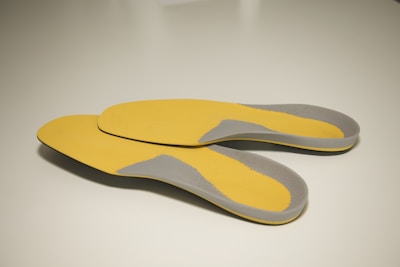 a yellow and white shoe