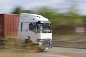 a truck driving on a road