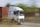 a truck driving on a road