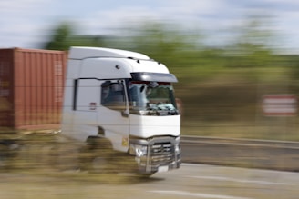 a truck driving on a road