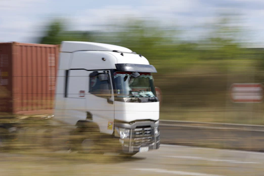 a truck driving on a road