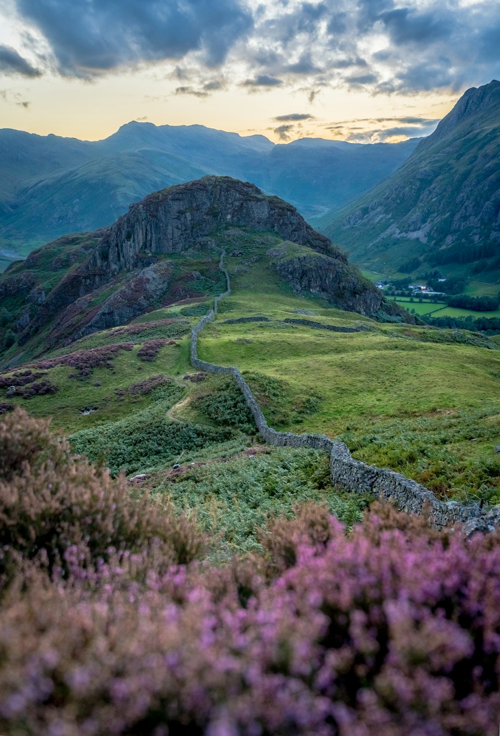 a winding road through a valley