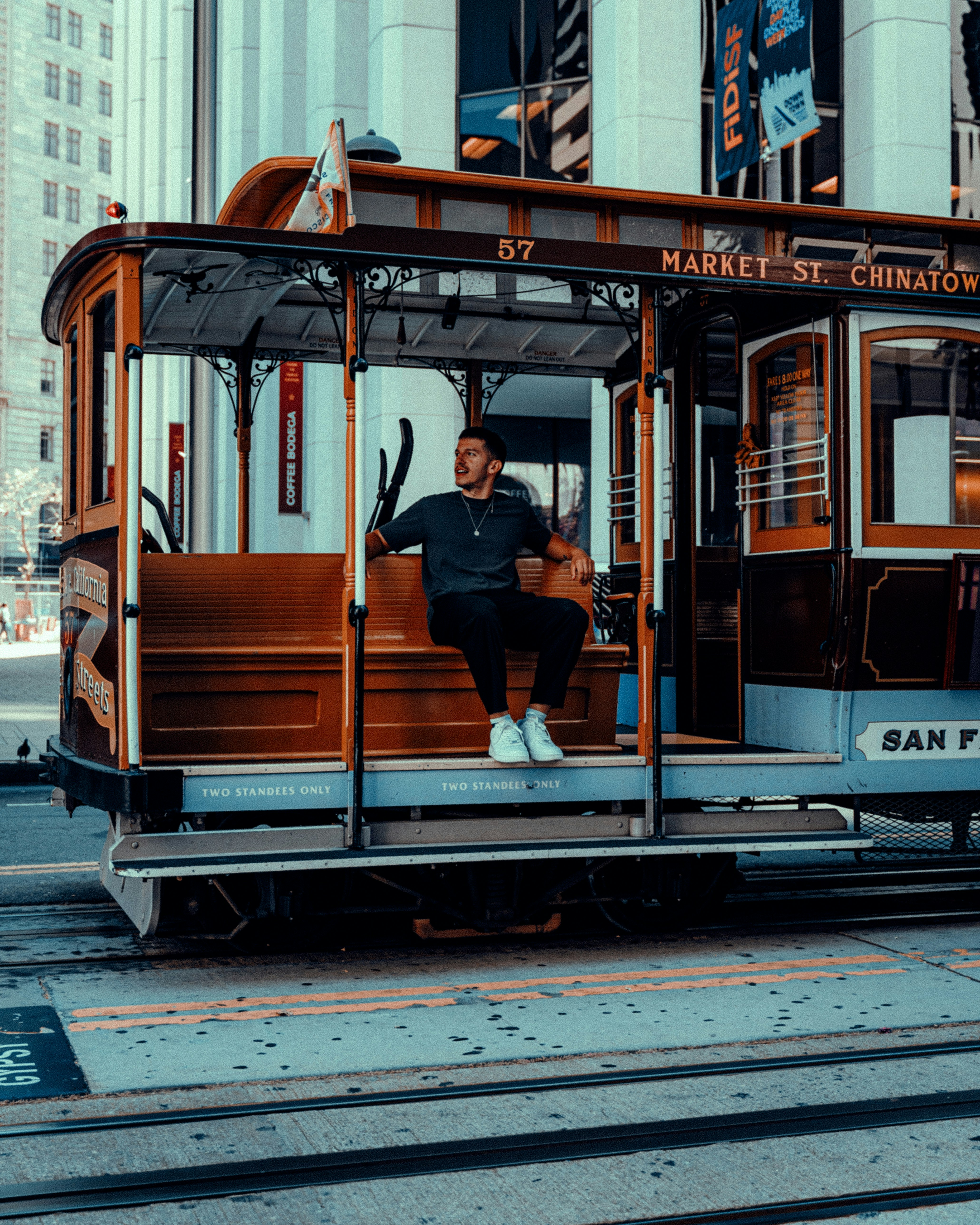 A person sitting in a trolley photo – Free Image on Unsplash
