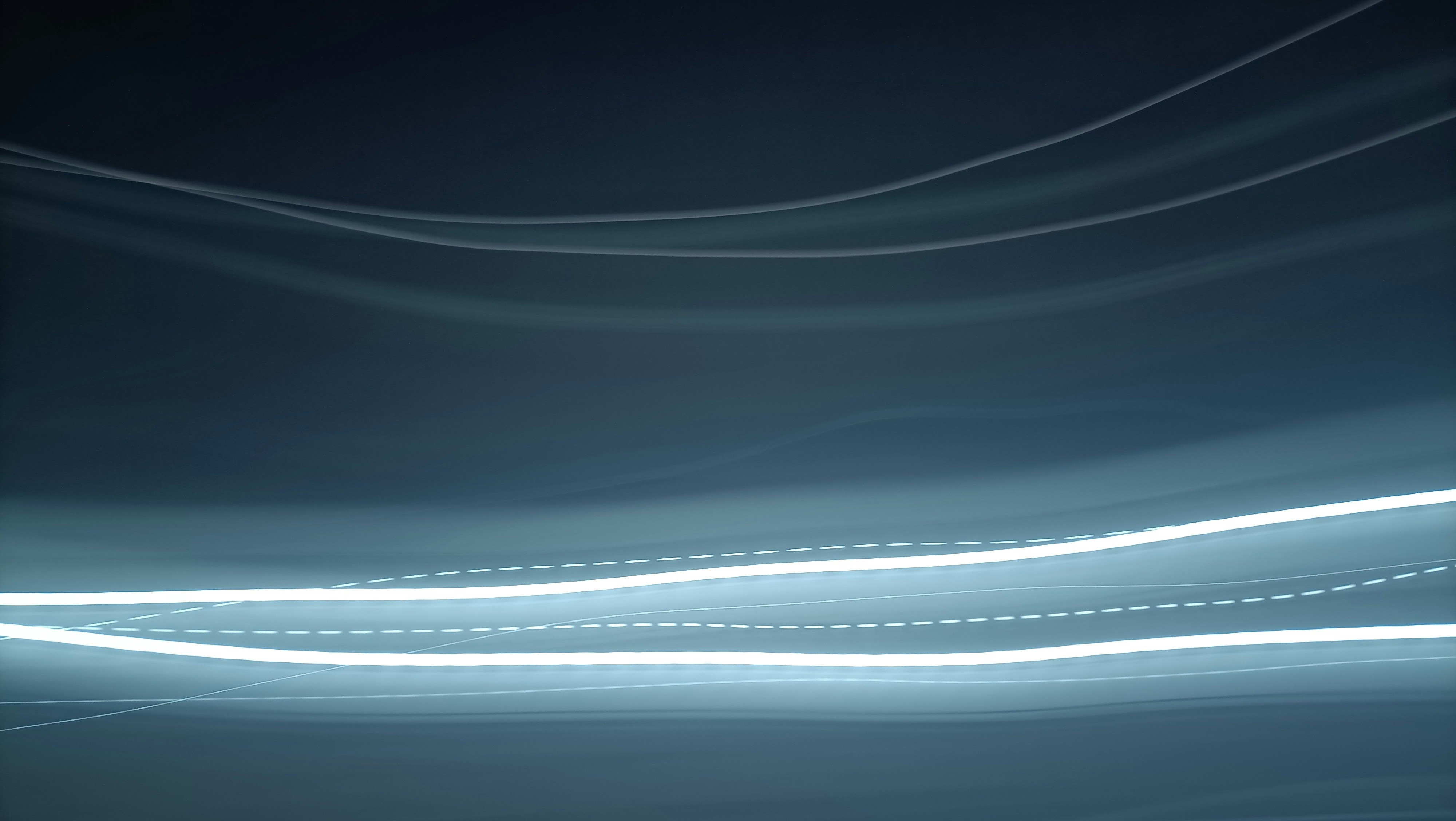 Abstract dark photography with light trails and bokeh, moody atmospheric aesthetic, minimal and editorial