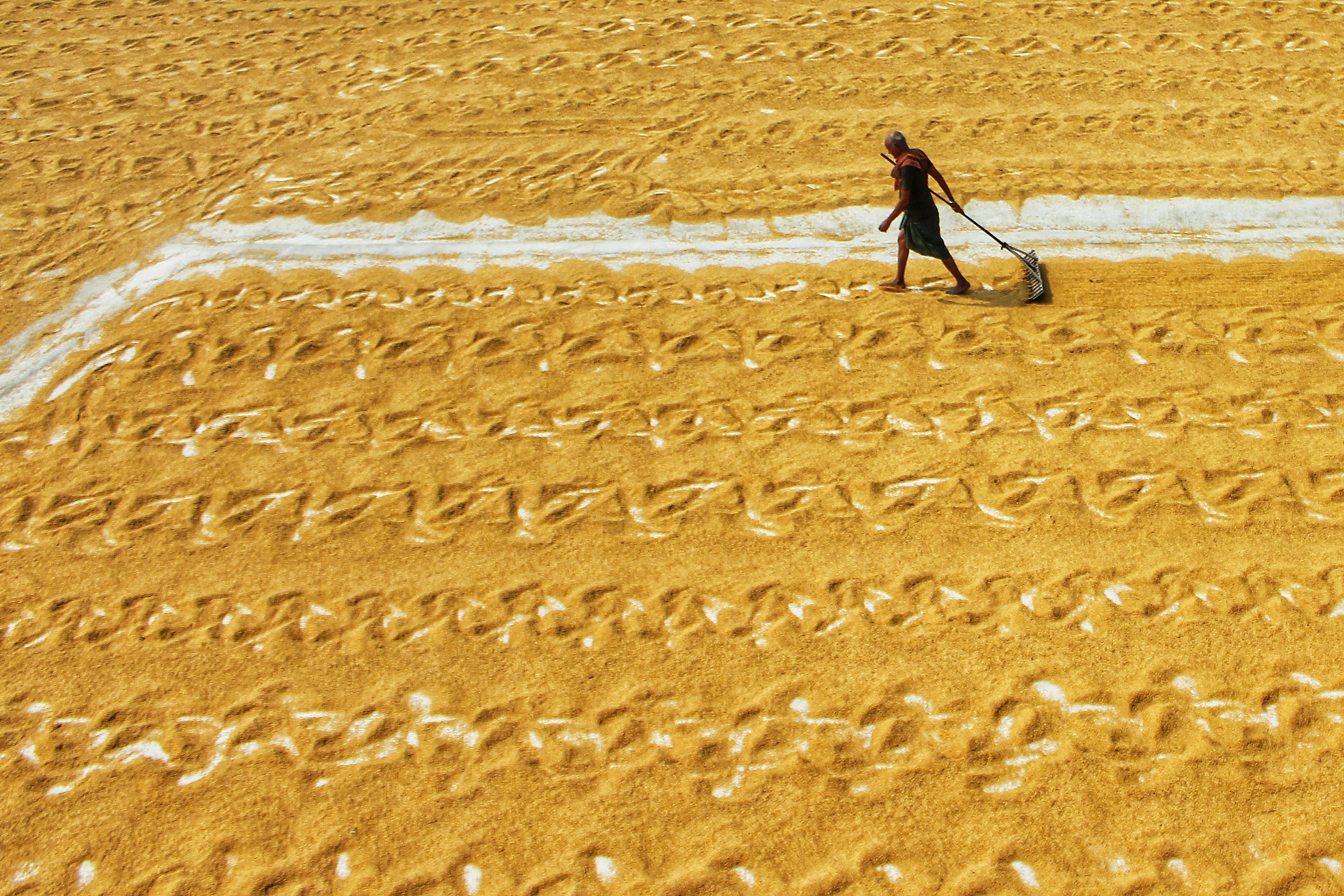 a person walking on the beach