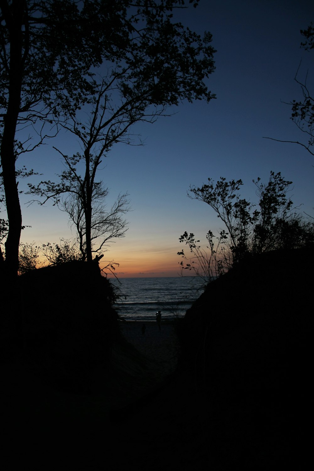 a sunset over a beach