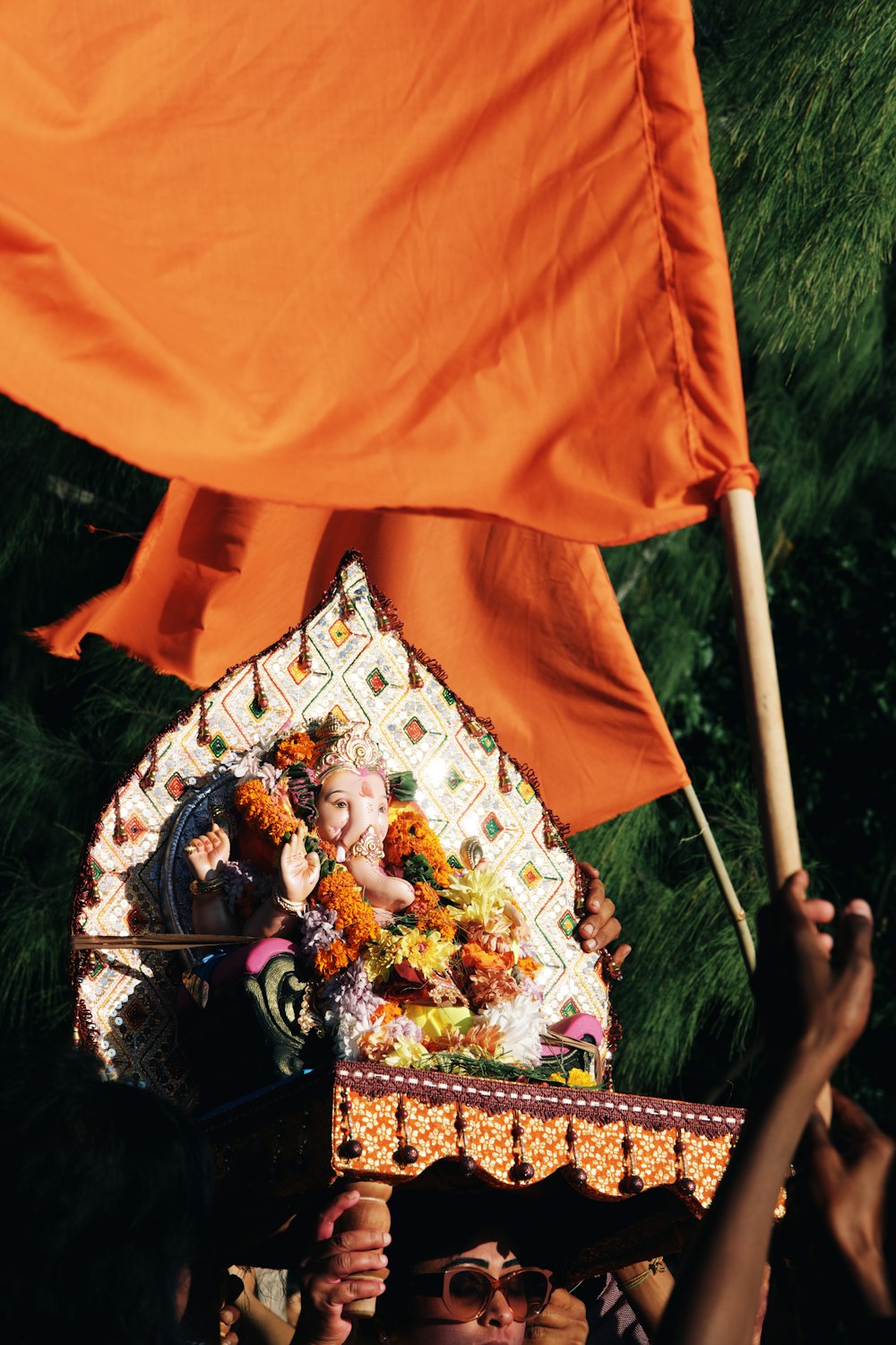 a person holding a colorful umbrella